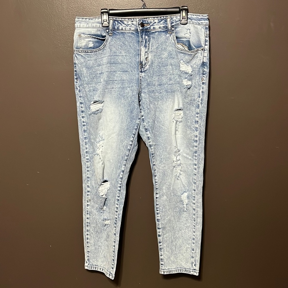 Distressed straight leg jeans.
